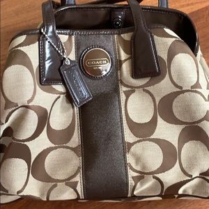 Gently used brown Coach handbag